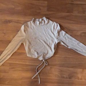 Amazon S nude cropped long sleeve open back